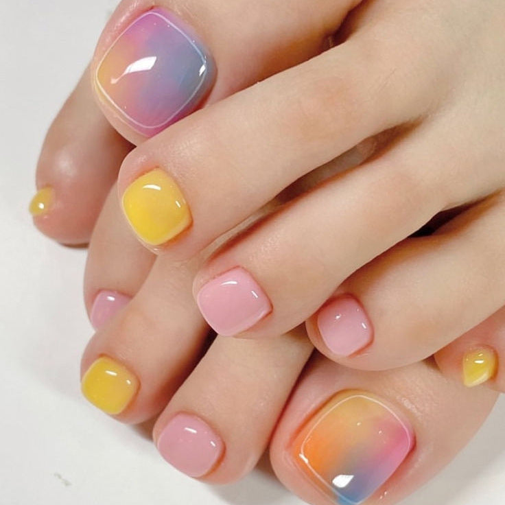 Nail art set with colorful gradient and elegant designs Stornfield
