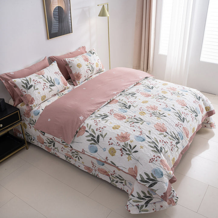 Quilted bedspread and bedding set with floral print, reversible function and decorative button placket