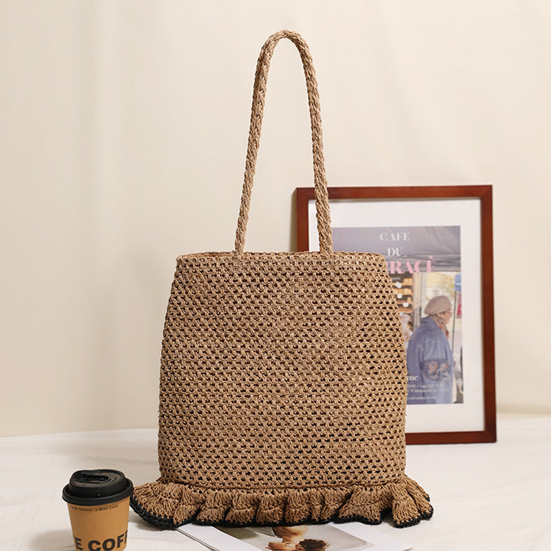 Handcrafted straw bag with fringed hem Stornfield