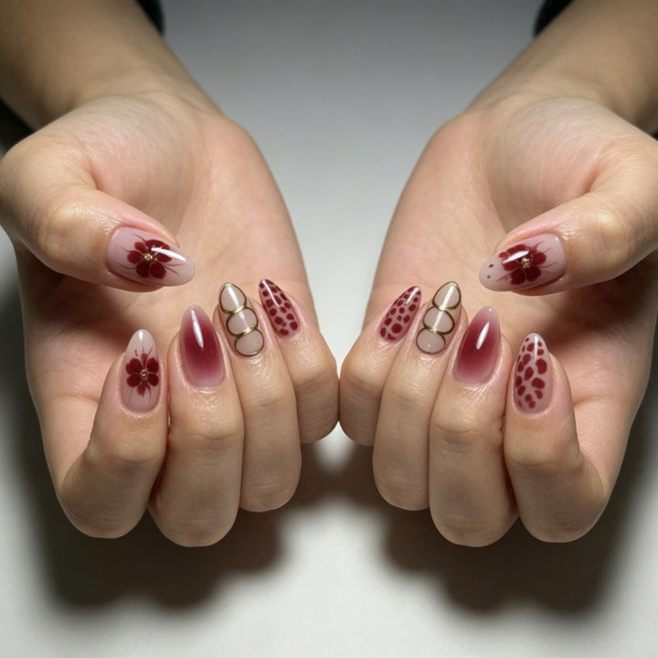 Artificial nails with elaborate flower designs and elegant accents Stornfield
