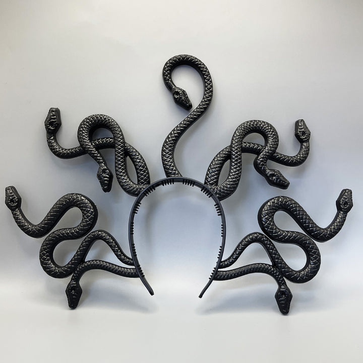 Medusa-inspired headband with 3D snake applications