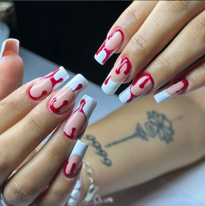 Artistic Press-On Nail Design with Dripping Effect Stornfield