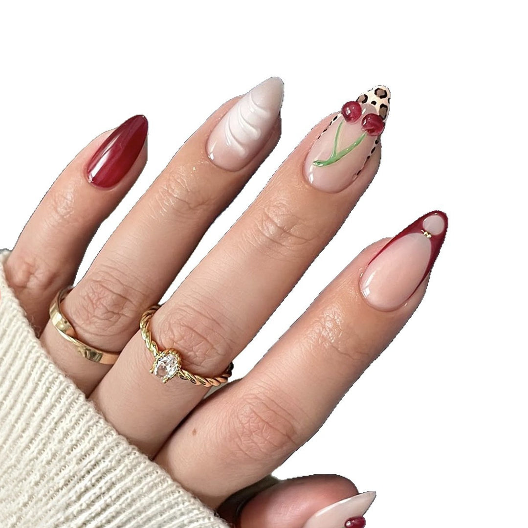Creative nail design with stylish floral and leopard pattern Stornfield