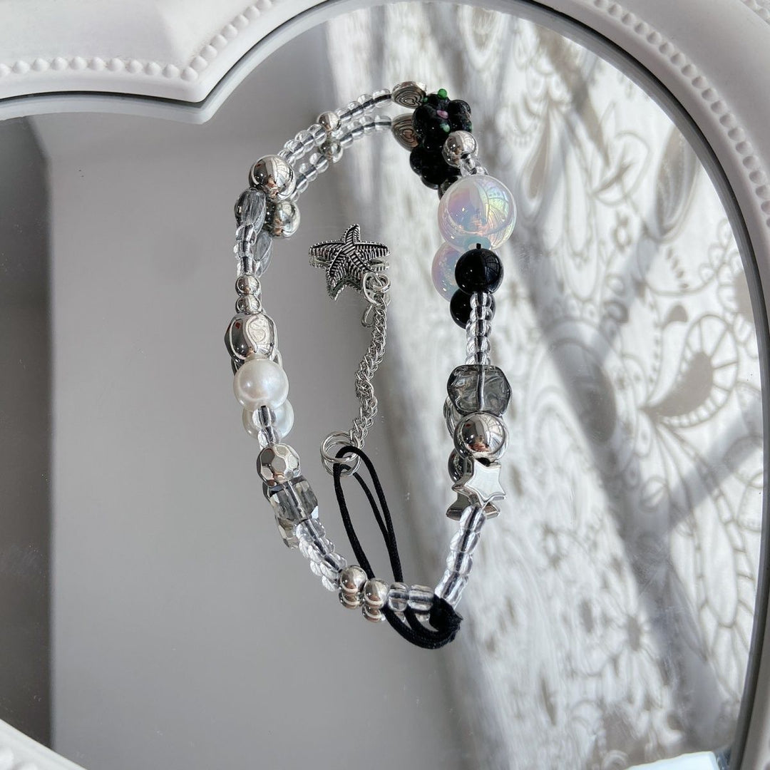 Elegant Beaded Charm Eyewear Holder Stornfield