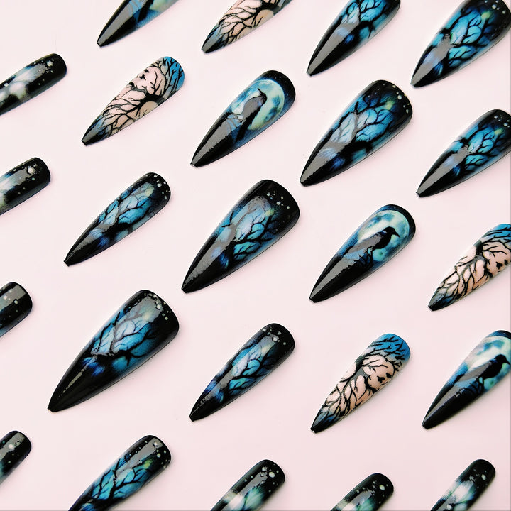 Creative artificial nails with mystical moon and crow design Stornfield