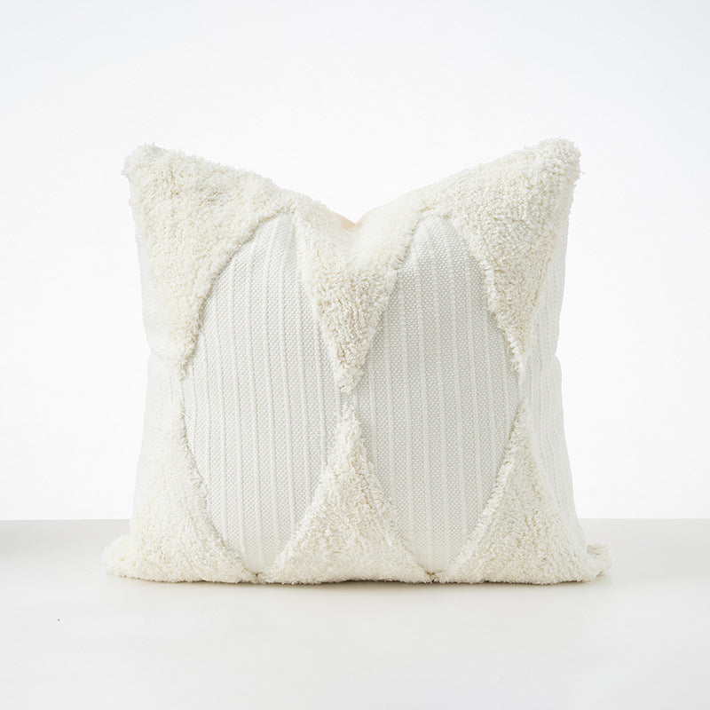 Square cushions with structured boucle look, quilted tufting and decorative tassels