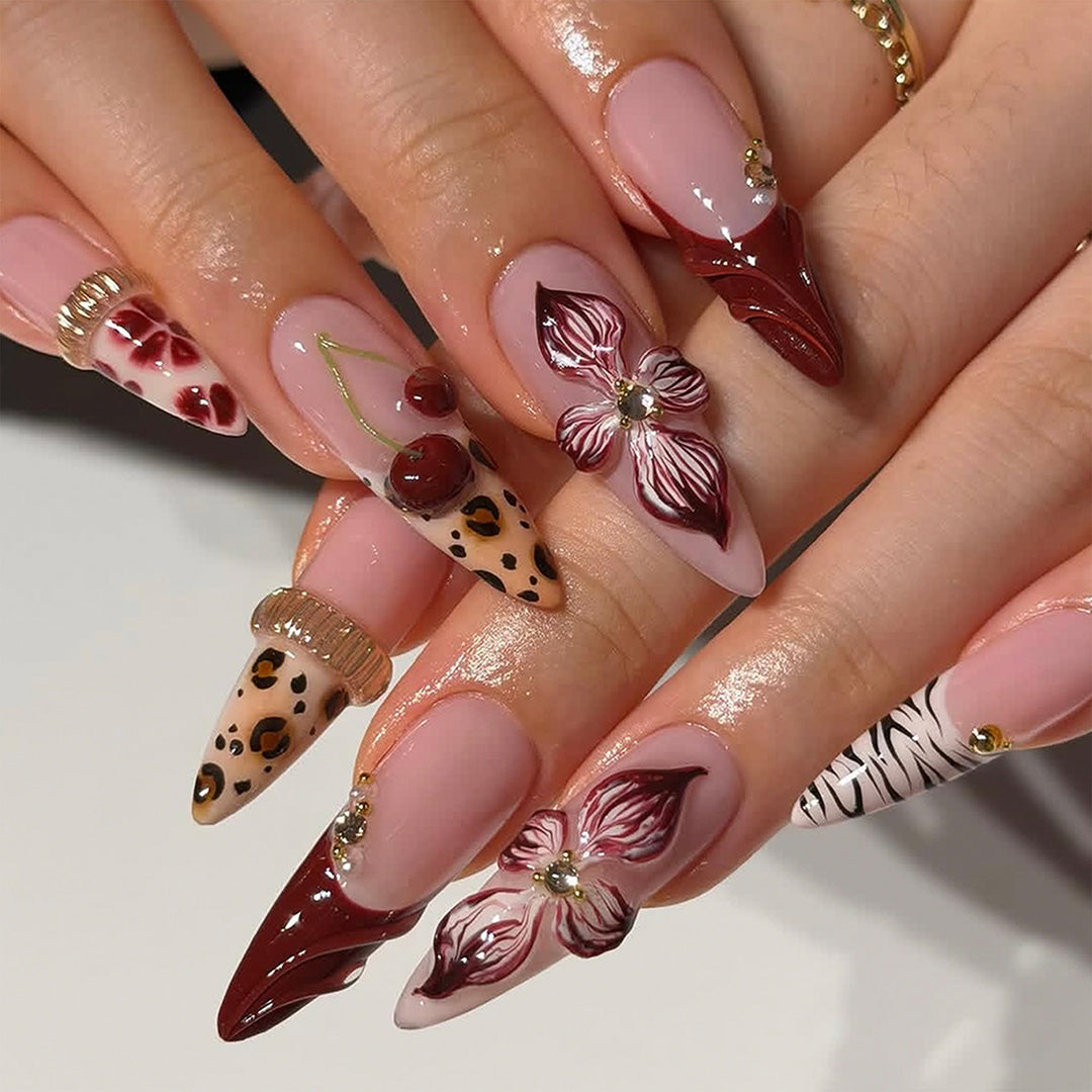 Artificial nail art with floral and animal motifs Stornfield