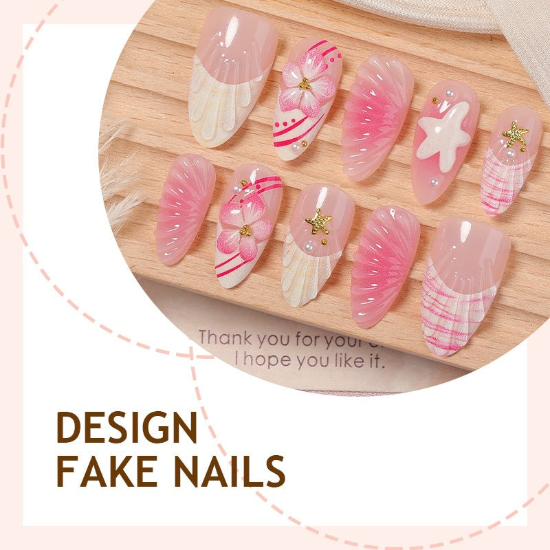 Artificial nail set with maritime shell and flower design Stornfield