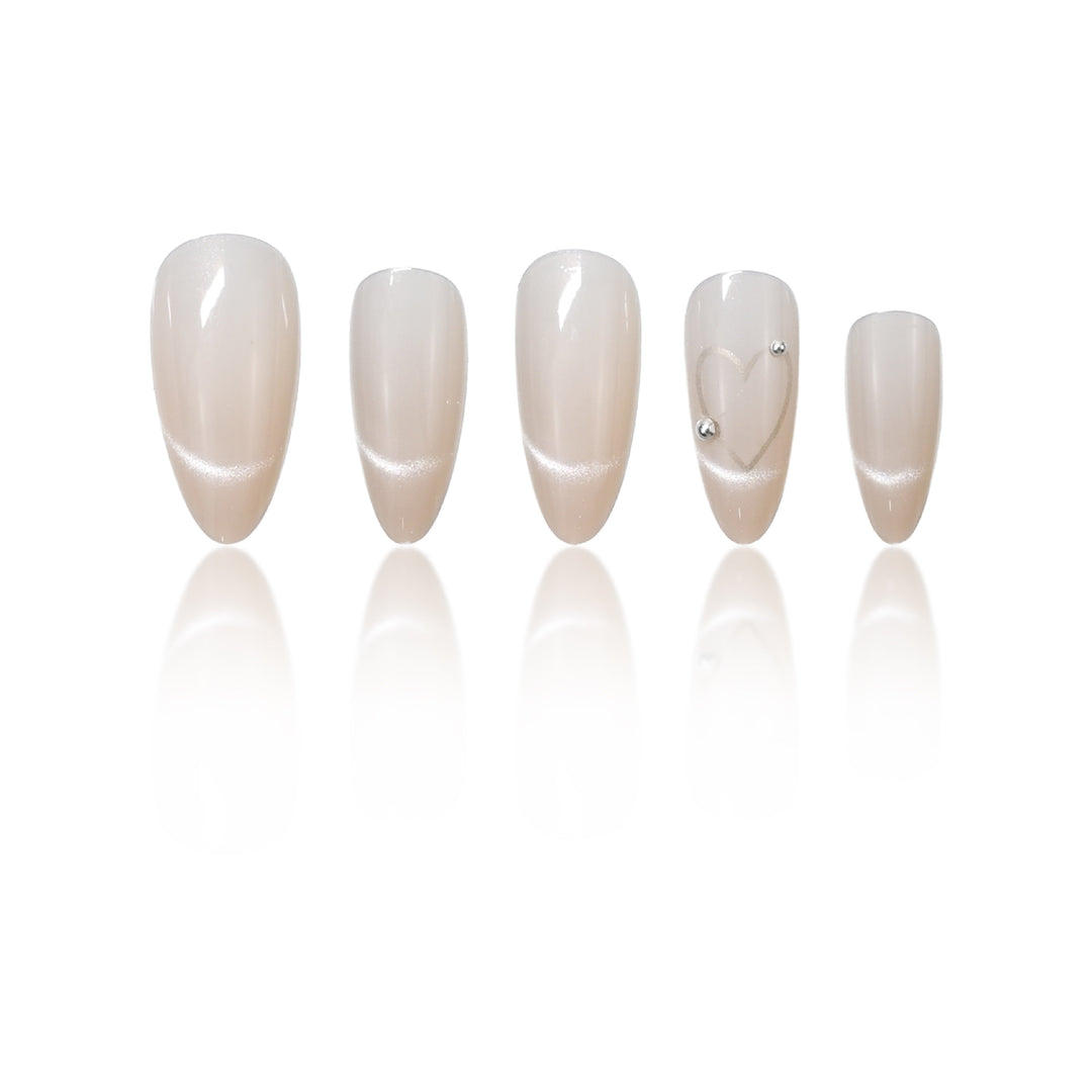 Elegant Stiletto Nail Extensions with Heart Accents