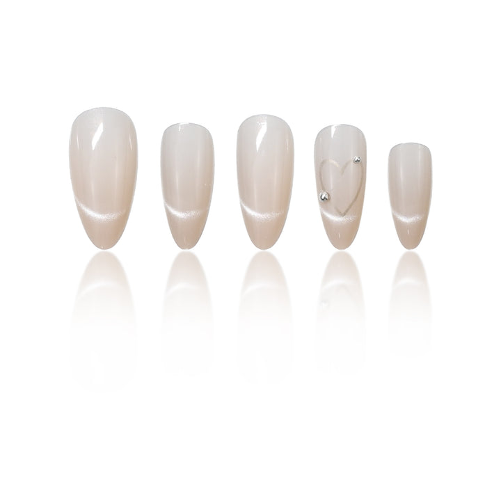 Elegant Stiletto Nail Extensions with Heart Accents