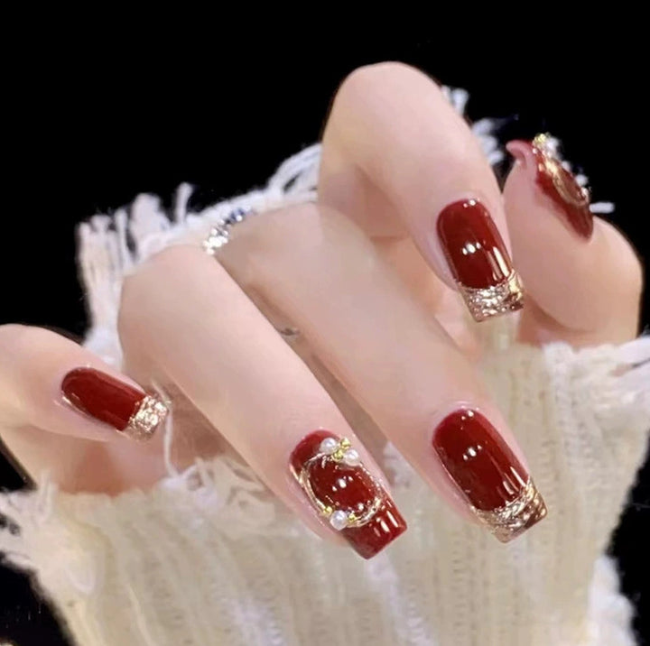 Elegant nail design with pearl embellishment Stornfield