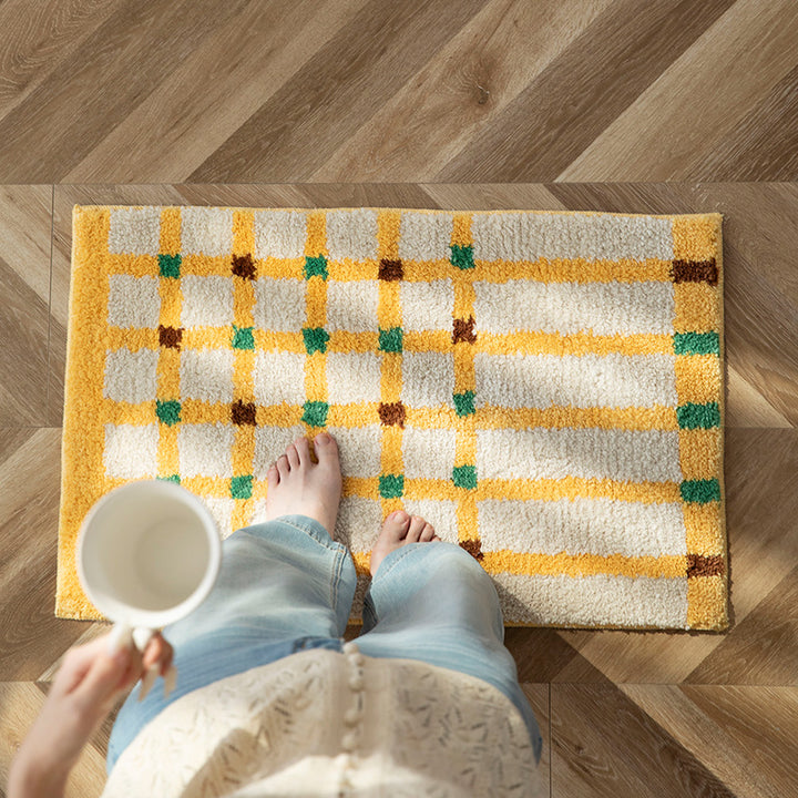 Soft runner bath mat with geometric checkered pattern and non-slip underside Stornfield