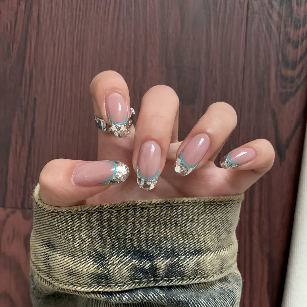 Artificial nails with shimmering glitter and elegant French-tip design Stornfield