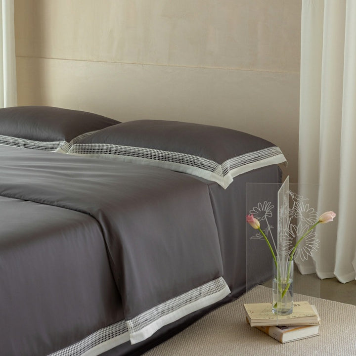 Elegant bedding set with lace grid trim and hotel closure