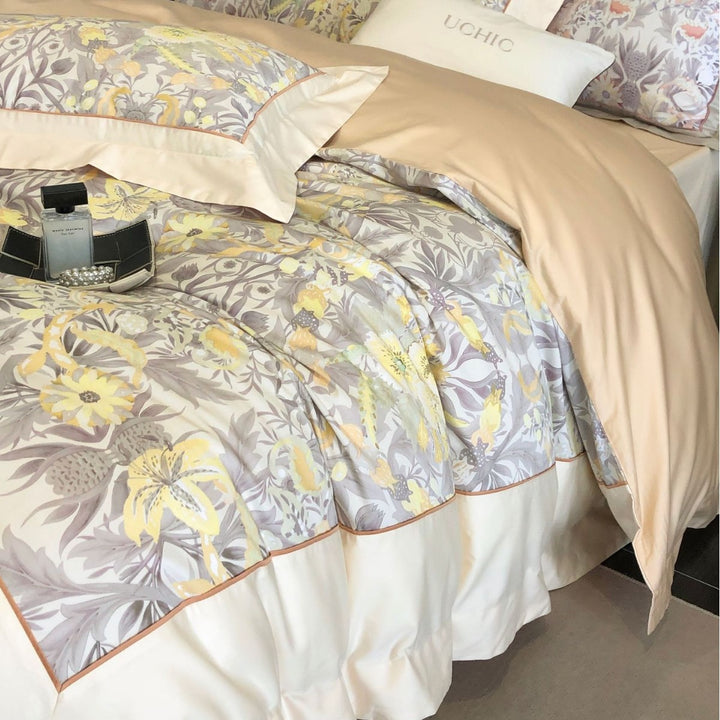 Luxurious cotton satin bedding set with floral print, ruffled bed skirt, and pillowcases