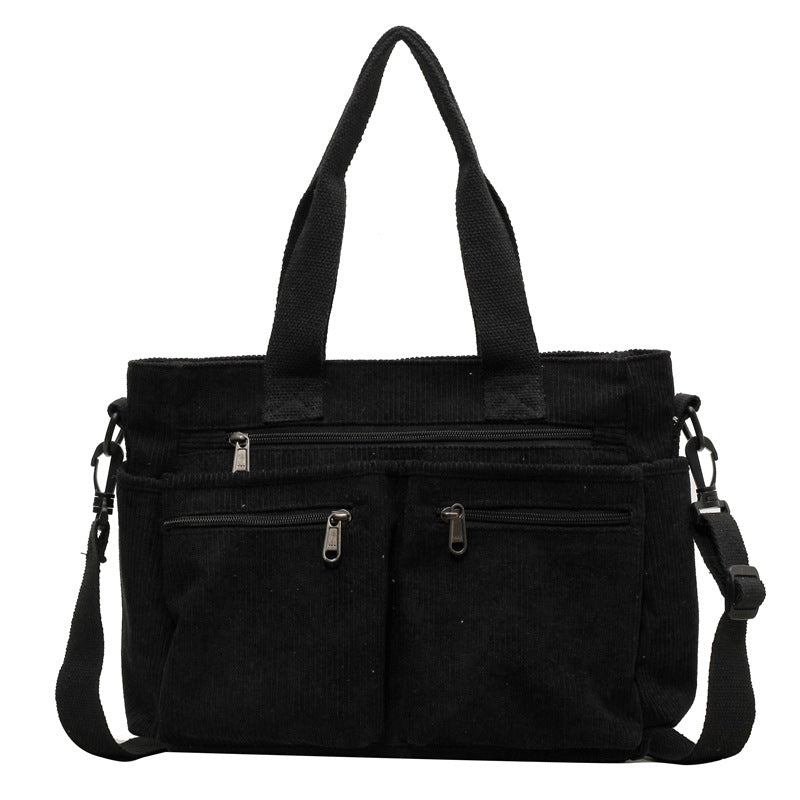 Durable shoulder bag with multiple compartments Stornfield