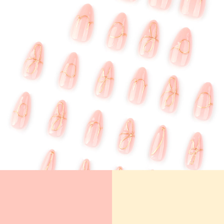 Creative nail art with golden accents and trendy lettering Stornfield