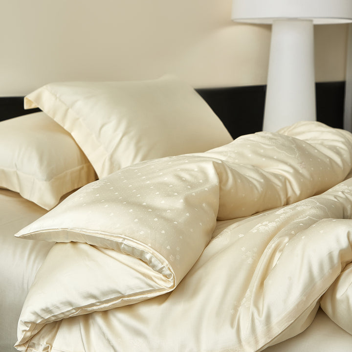 Satin bedding set with silky feel, hotel closure and tone-on-tone pattern