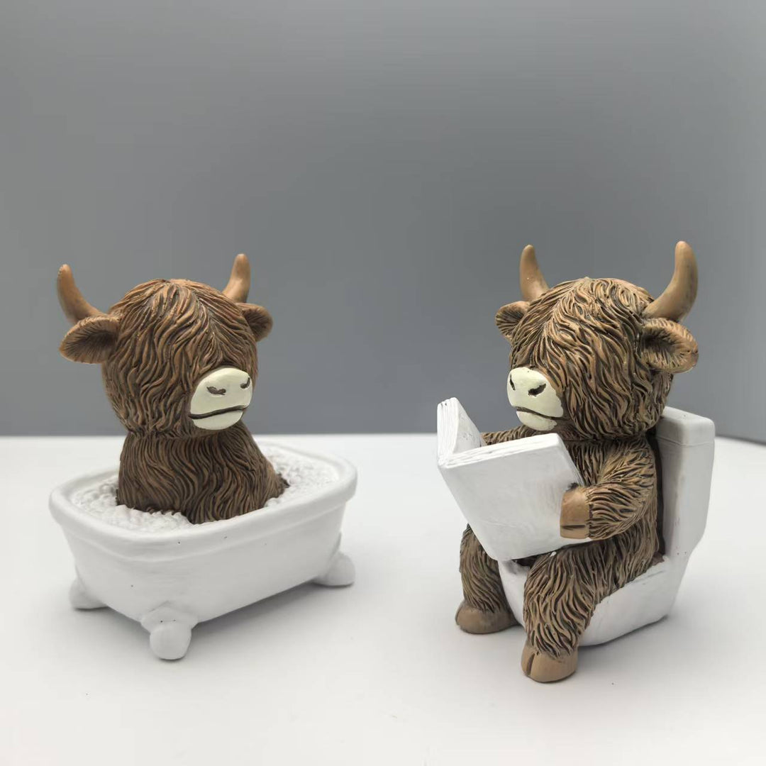 Funny decorative figure of a Highland cow in a bathtub Stornfield