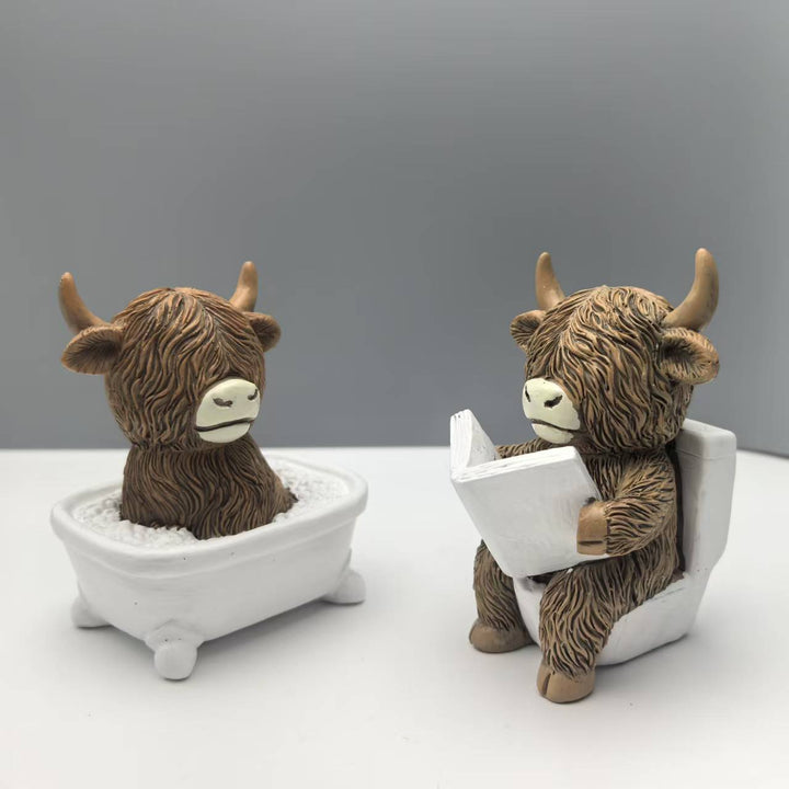 Funny decorative figure of a Highland cow in a bathtub Stornfield