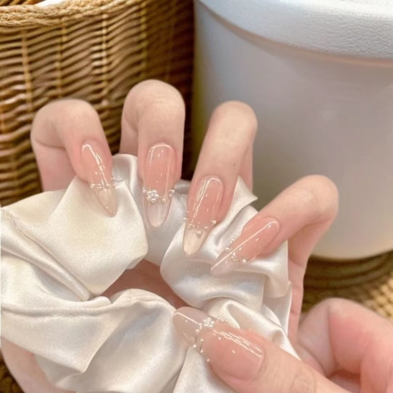 Decorative Acrylic Nail Extensions with Pearlescent Accents