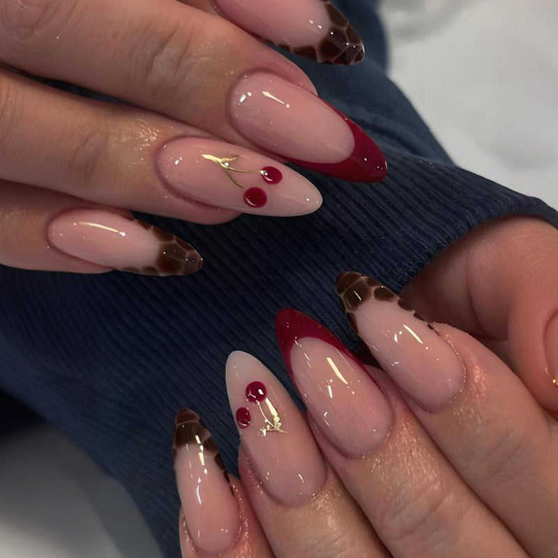 Artificial nail set with elegant ombré designs and glamorous accents Stornfield