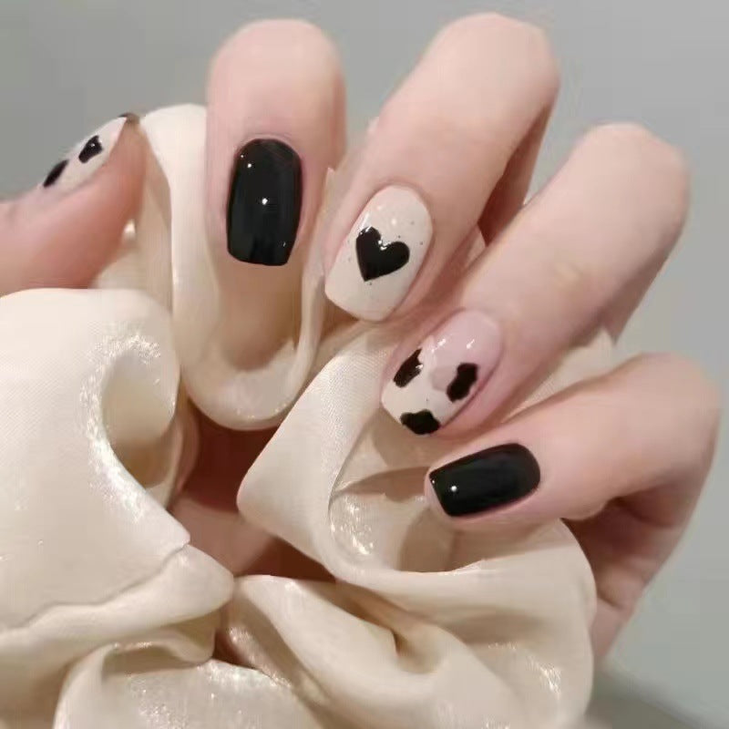 Creative nail art with heart and animal motifs Stornfield