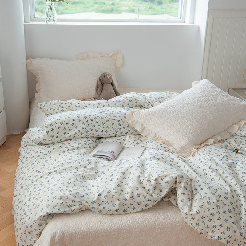 Cotton muslin duvet cover set with delicate mini flower print and ruffled pillow