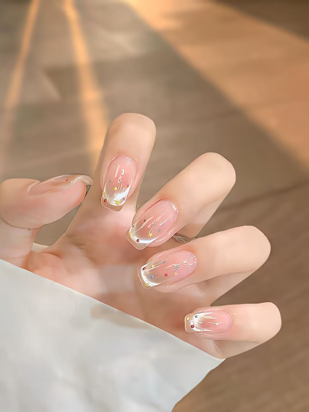 Trendy artificial nails with glitter effects Stornfield
