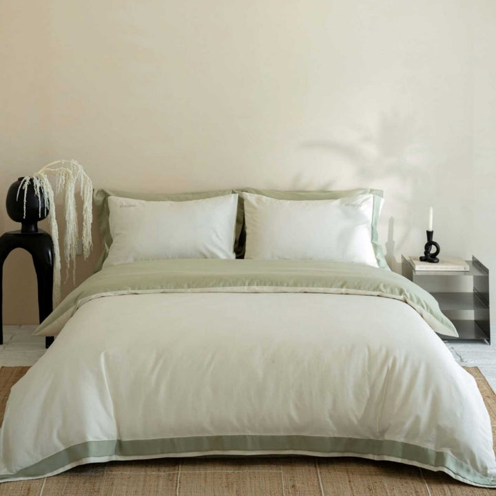 Premium bedding set made of cotton satin with fine cassette trim and hotel closure