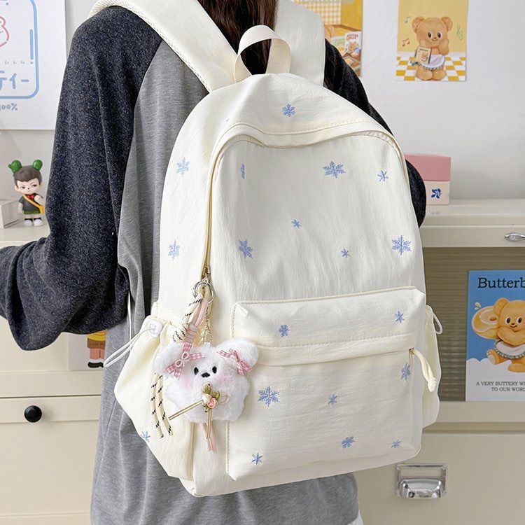 Playful backpack with fine embroidery Stornfield