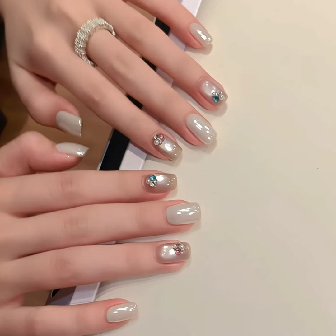 Decorative Nail Art Extensions with Crystal Accents