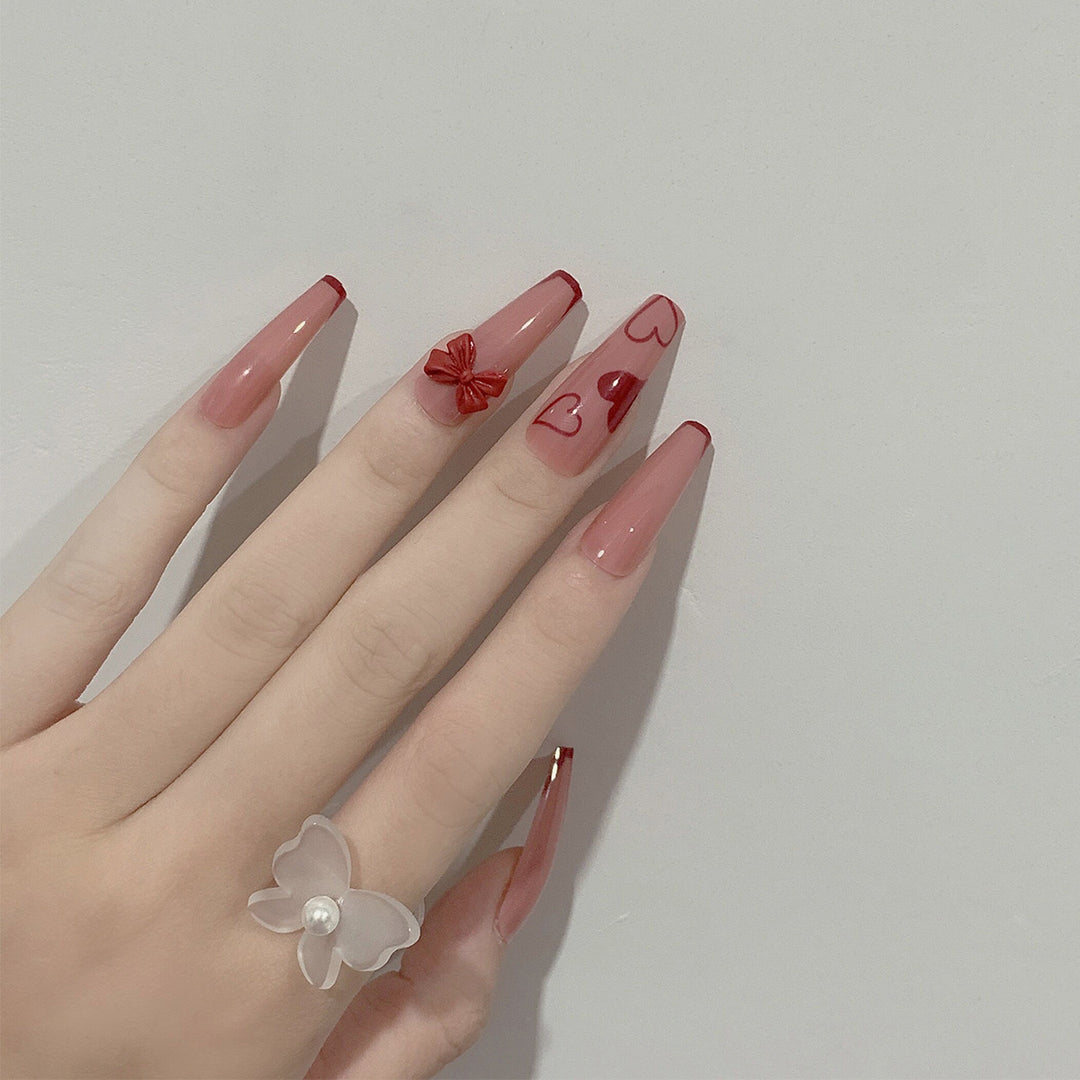 Elegant Artistic Nail Extensions with Romantic Heart Designs Stornfield
