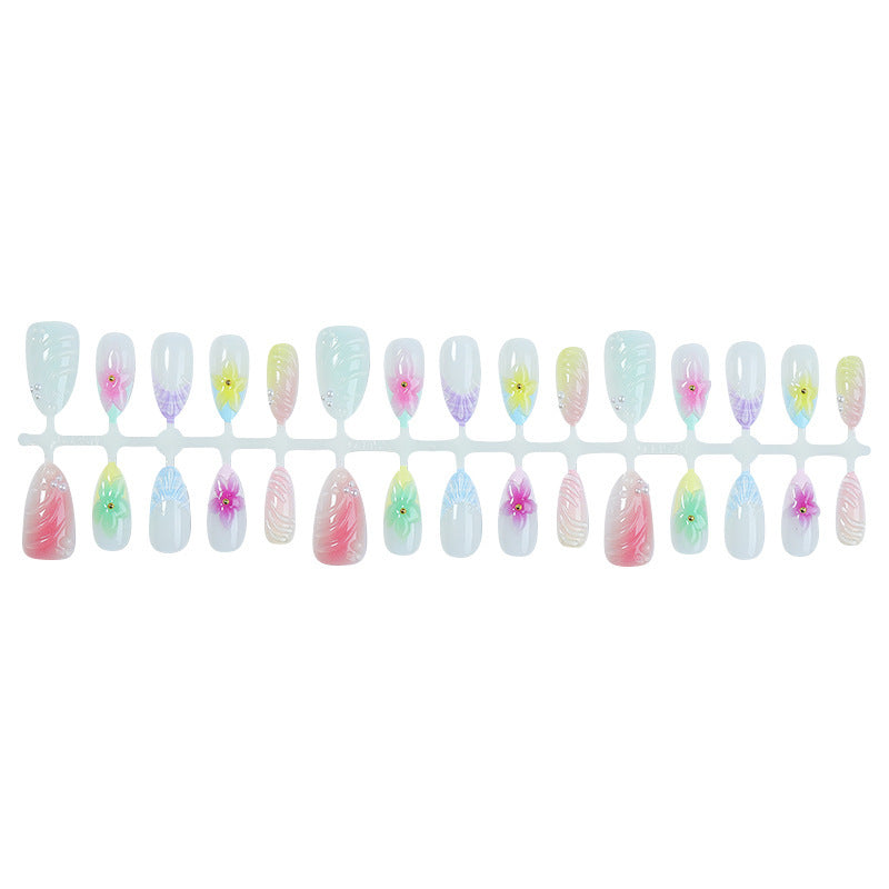Nail set with colorful floral design and glitter accents Stornfield