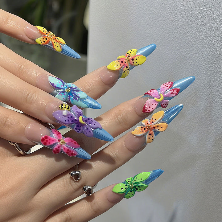 Artificial nails with colorful 3D flower designs Stornfield