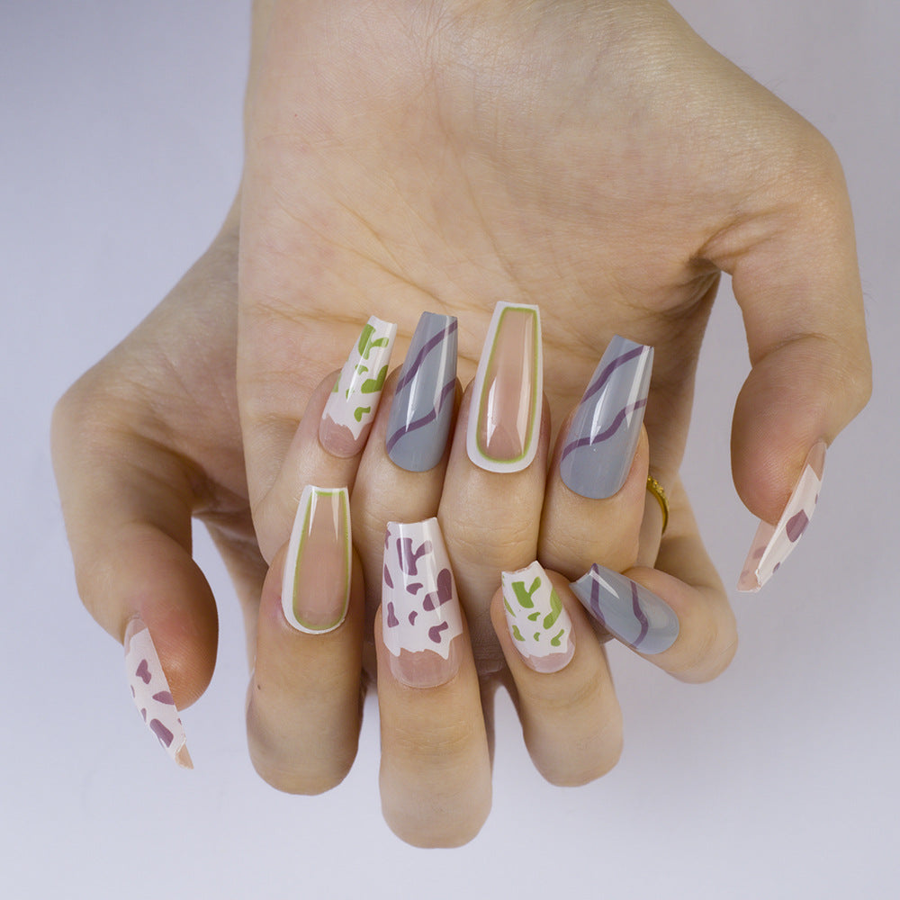 Artificial Nails in Modern Design with Graphic Patterns Stornfield