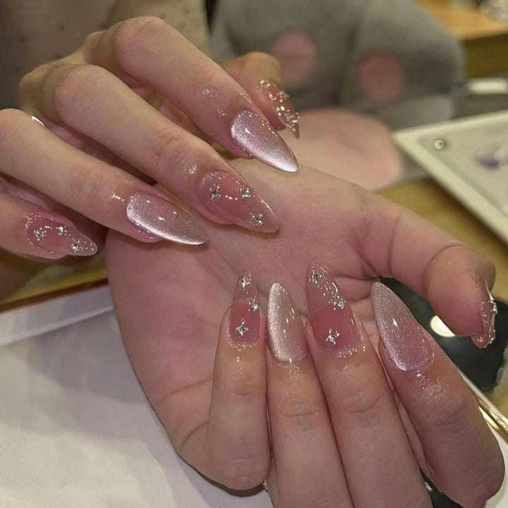 Artful stiletto nails with glitter accents Stornfield