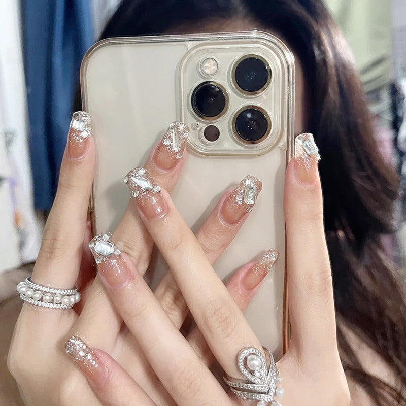 Artificial nails with elegant rhinestone accents Stornfield