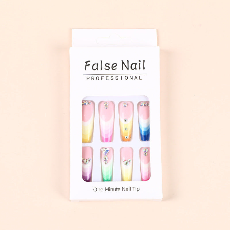 Artificial nails in luxurious ombre design with rhinestone accents Stornfield