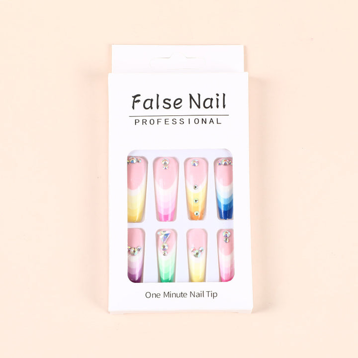 Artificial nails in luxurious ombre design with rhinestone accents Stornfield