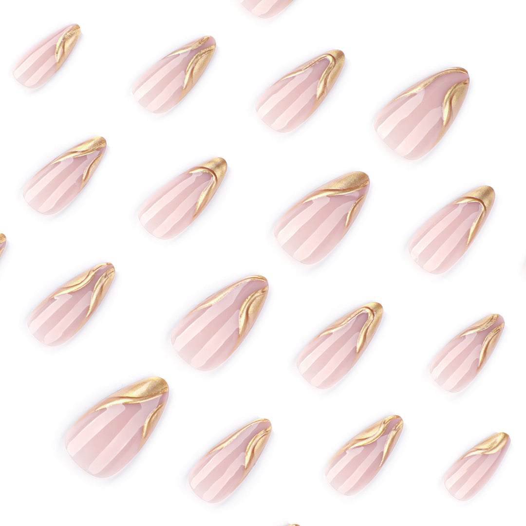 Elegant Stiletto Nails with Shimmering Gold Accent Stornfield