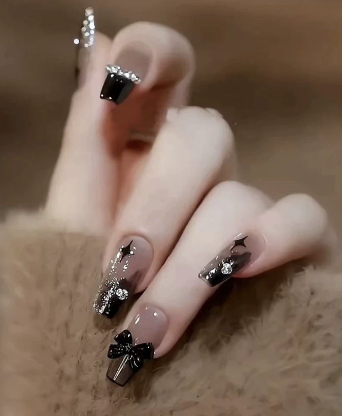 Elegant nail design with pearl embellishment Stornfield