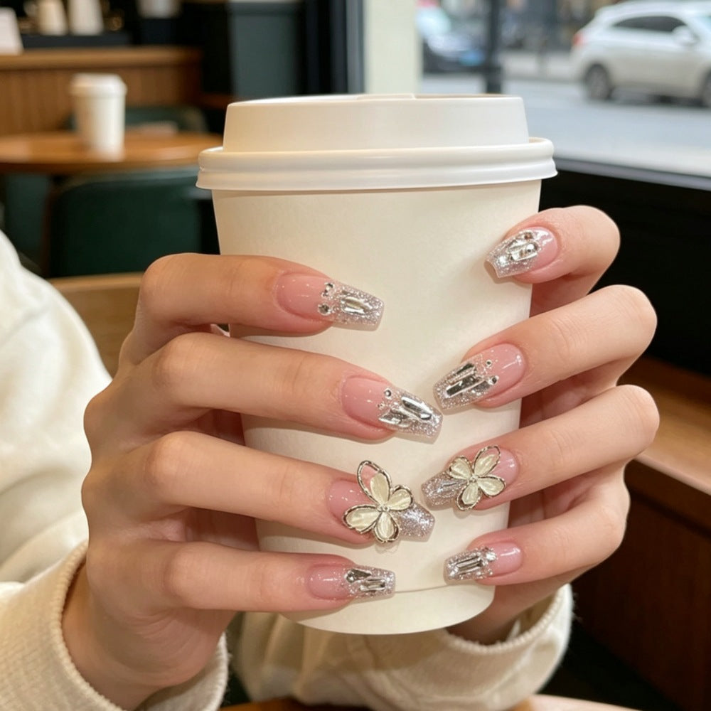 Glamorous Press-On Nail Set with Floral and Glitter Accents Stornfield