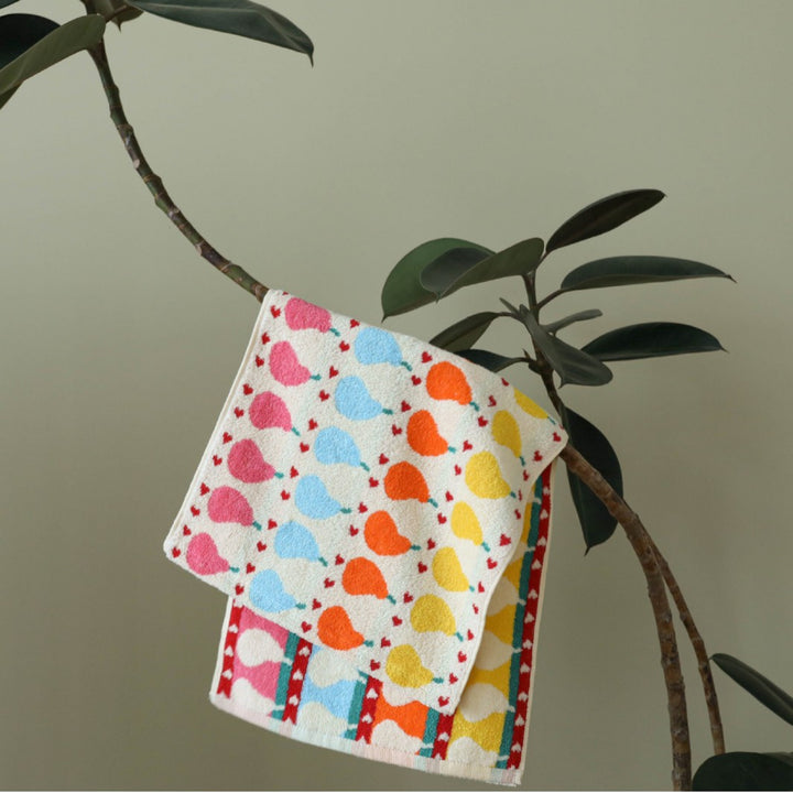 Jacquard guest towel made of cotton terry with playful bird and heart pattern