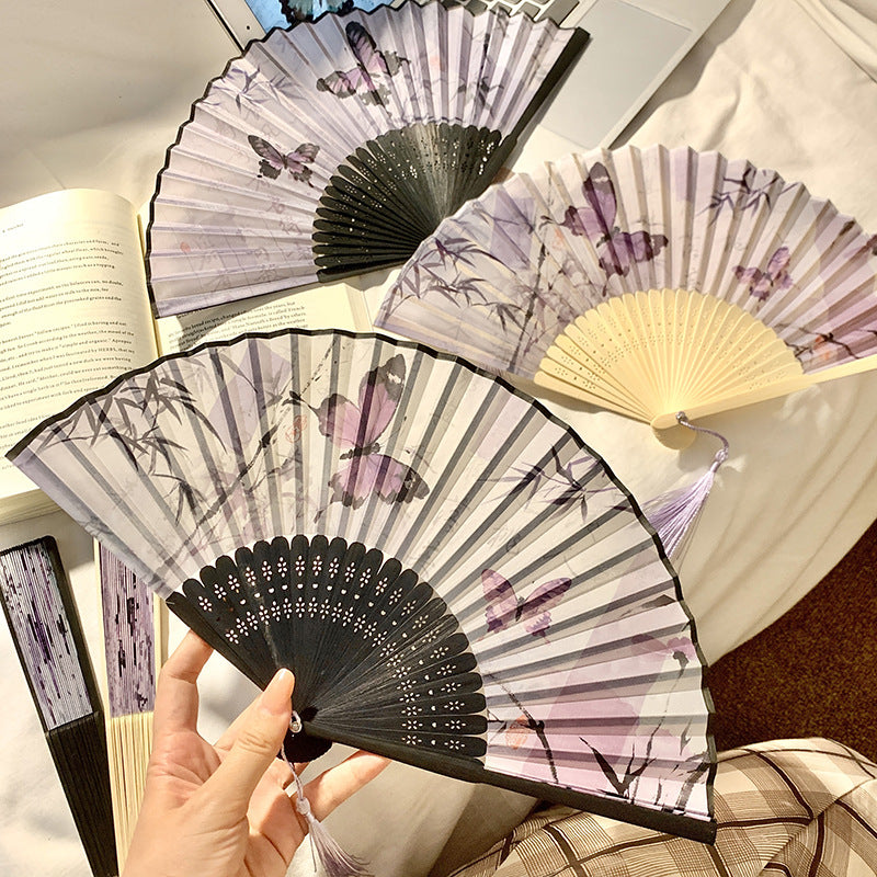 Elegant fan with elaborate butterfly motif Stornfield
