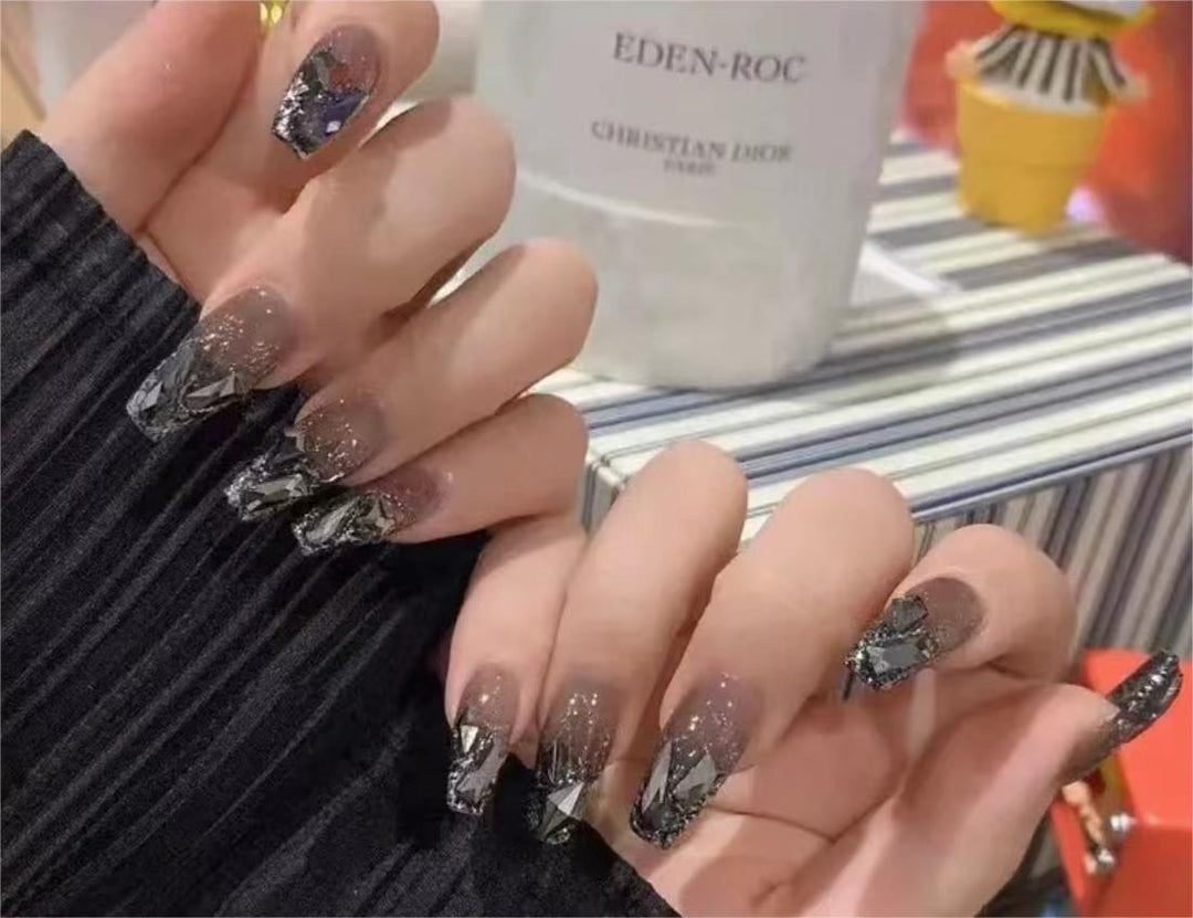 Elegant Nail Art with Glitter and Rhinestones Stornfield