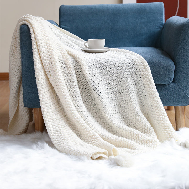 Women’s knitted blanket with decorative tassels Stornfield