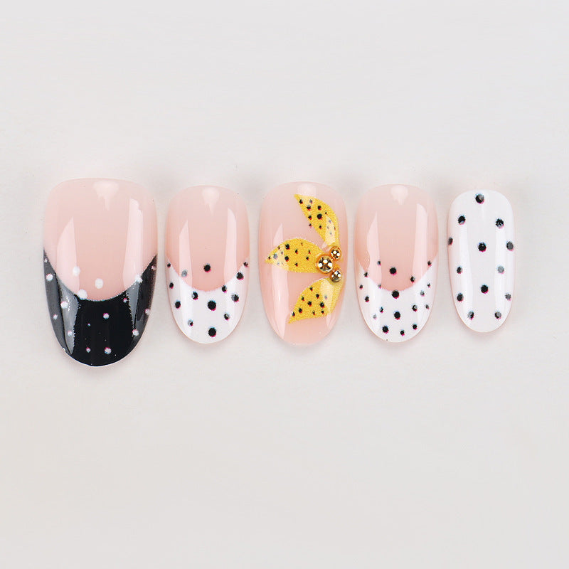 Artistic Press-On Nails with Floral and Polka Dot Designs Stornfield