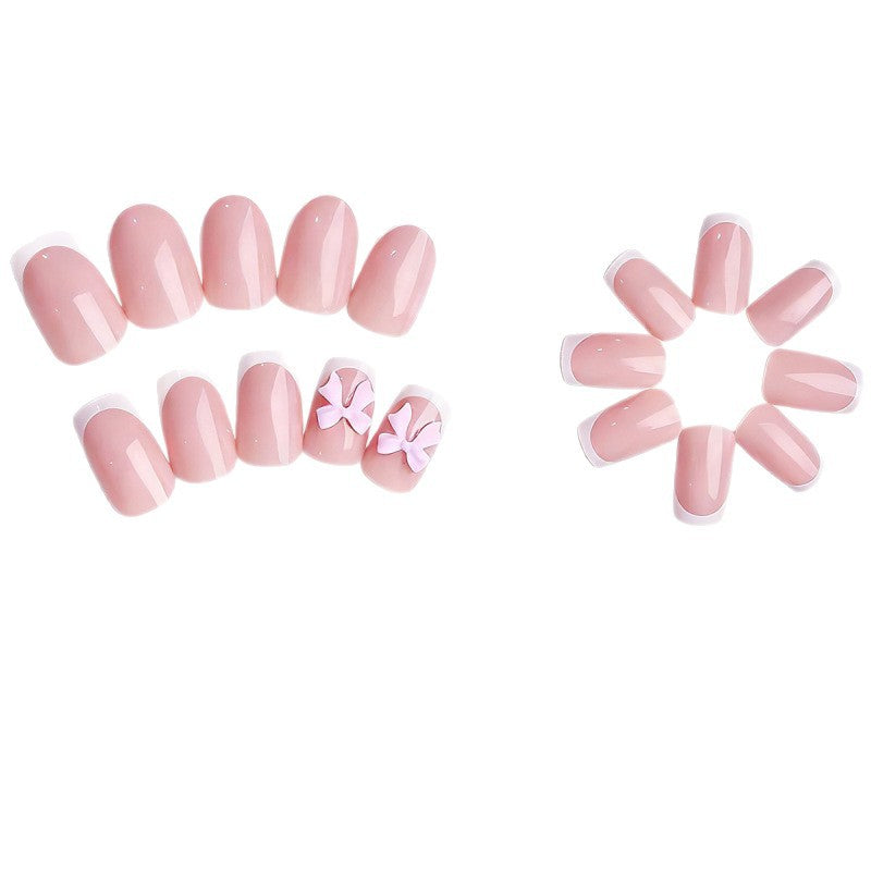 Exclusive artificial nails with decorative bows and pearl details Stornfield