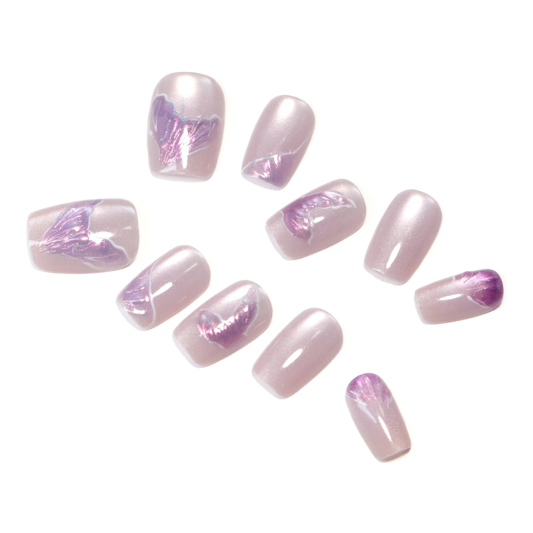 Artfully designed nail extensions with elegant flower motifs Stornfield
